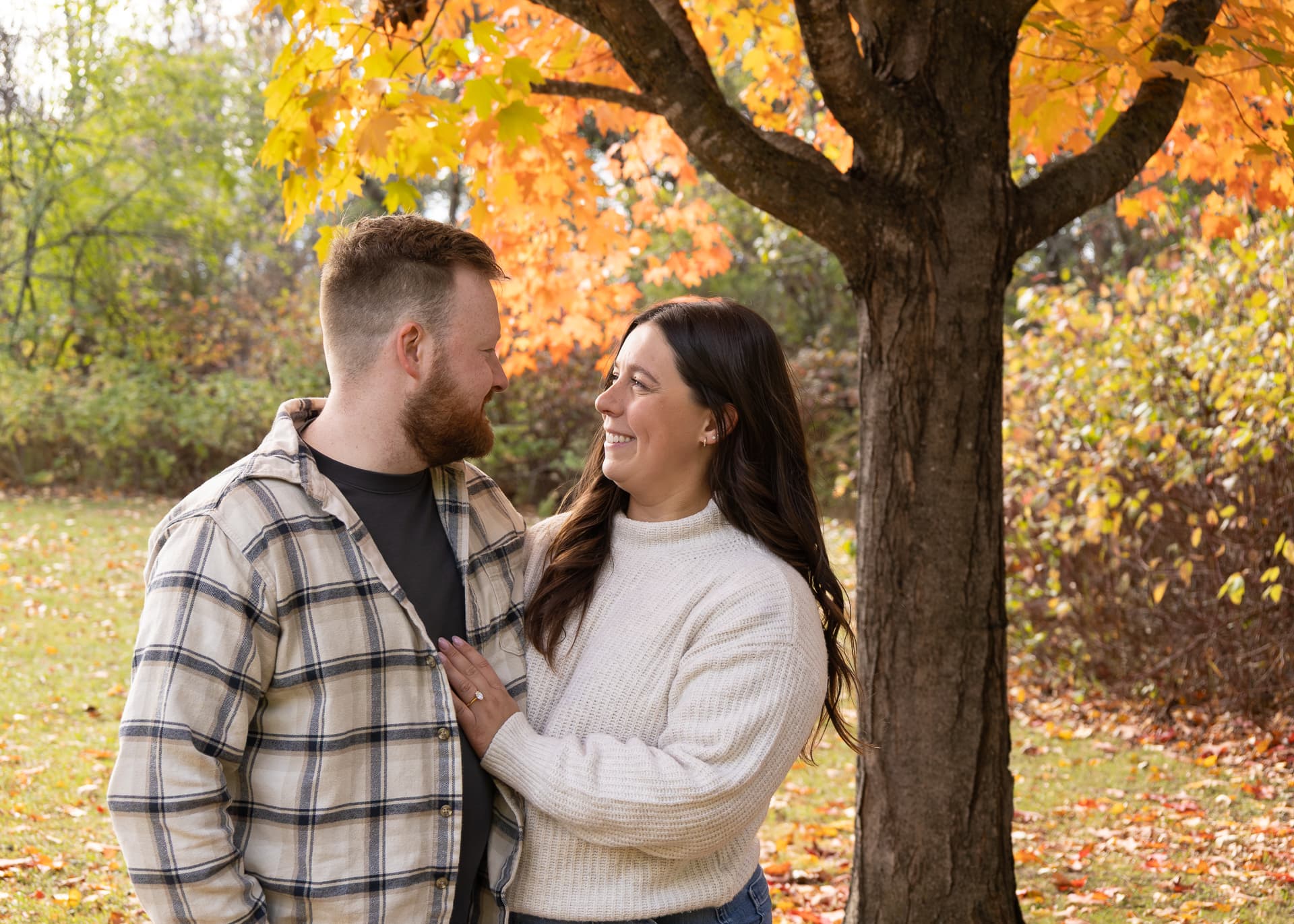 Thomas and Alicia under autumn tree
